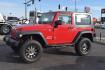 2010 RED /GRAY Jeep Wrangler Sport 4WD (1J4AA2D17AL) with an 3.8L V6 OHV 12V engine, 6-SPEED transmission, located at 607 W Columbia Drive, Kennewick, WA, 99336, (509) 987-1069, 0.000000, 0.000000 - FOR MORE INFORMATION PLEASE GIVE US A CALL TOLL FREE AT 509-582-8818 OR FOR MORE OPTIONS PLEASE VIEW OUR INVENTORY ON THE WEB AT USAAUTOSALES.NET Si te gusta este vehiculo y usted tiene preguntas, por favor llame gratis al numero (509) 582-8818 y alguien le ayudara. VEHICLE PRICE DOES NOT INCLUDE TA - Photo#0