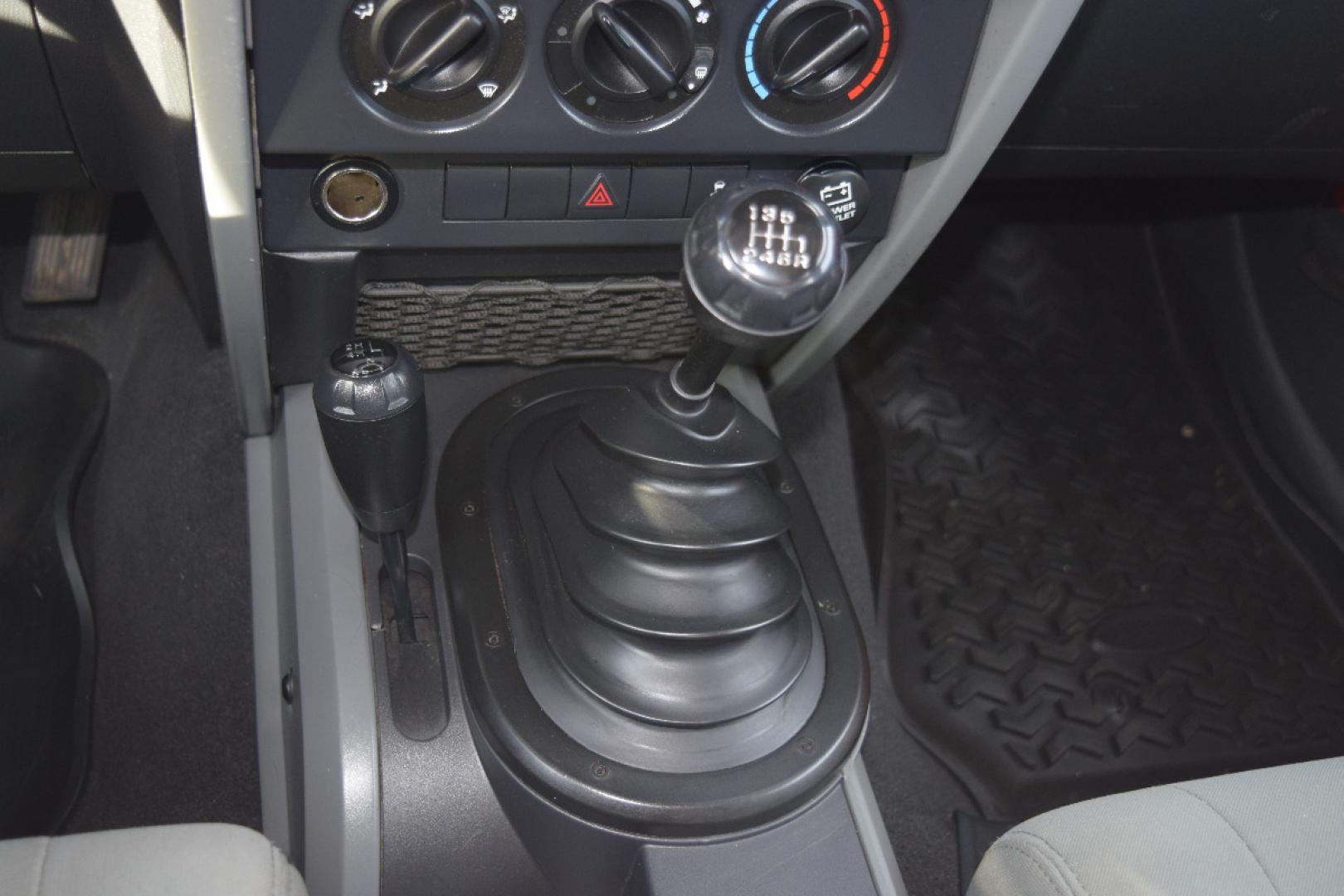 2010 RED /GRAY Jeep Wrangler Sport 4WD (1J4AA2D17AL) with an 3.8L V6 OHV 12V engine, 6-SPEED transmission, located at 607 W Columbia Drive, Kennewick, WA, 99336, (509) 987-1069, 0.000000, 0.000000 - FOR MORE INFORMATION PLEASE GIVE US A CALL TOLL FREE AT 509-582-8818 OR FOR MORE OPTIONS PLEASE VIEW OUR INVENTORY ON THE WEB AT USAAUTOSALES.NET Si te gusta este vehiculo y usted tiene preguntas, por favor llame gratis al numero (509) 582-8818 y alguien le ayudara. VEHICLE PRICE DOES NOT INCLUDE TA - Photo#11