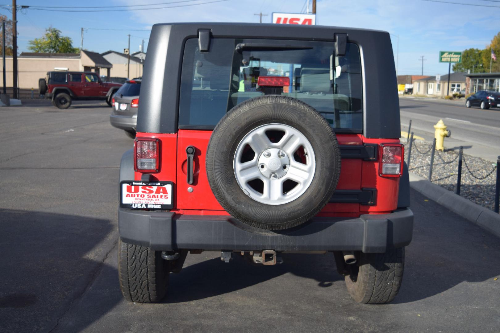 2010 RED /GRAY Jeep Wrangler Sport 4WD (1J4AA2D17AL) with an 3.8L V6 OHV 12V engine, 6-SPEED transmission, located at 607 W Columbia Drive, Kennewick, WA, 99336, (509) 987-1069, 0.000000, 0.000000 - FOR MORE INFORMATION PLEASE GIVE US A CALL TOLL FREE AT 509-582-8818 OR FOR MORE OPTIONS PLEASE VIEW OUR INVENTORY ON THE WEB AT USAAUTOSALES.NET Si te gusta este vehiculo y usted tiene preguntas, por favor llame gratis al numero (509) 582-8818 y alguien le ayudara. VEHICLE PRICE DOES NOT INCLUDE TA - Photo#3